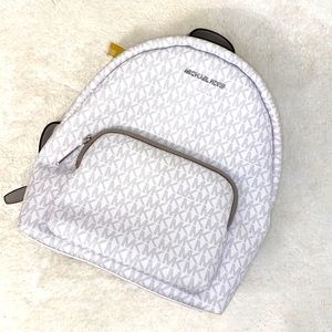 Michael Kors Erin style bright white medium backpack. Never used with tag.